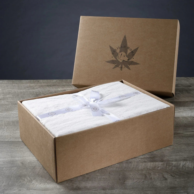 White organic hemp bed sheets in a gift box