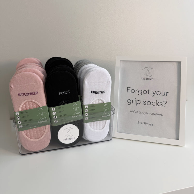 Medium studio sock set displayed beside the Balanced grip socks sign